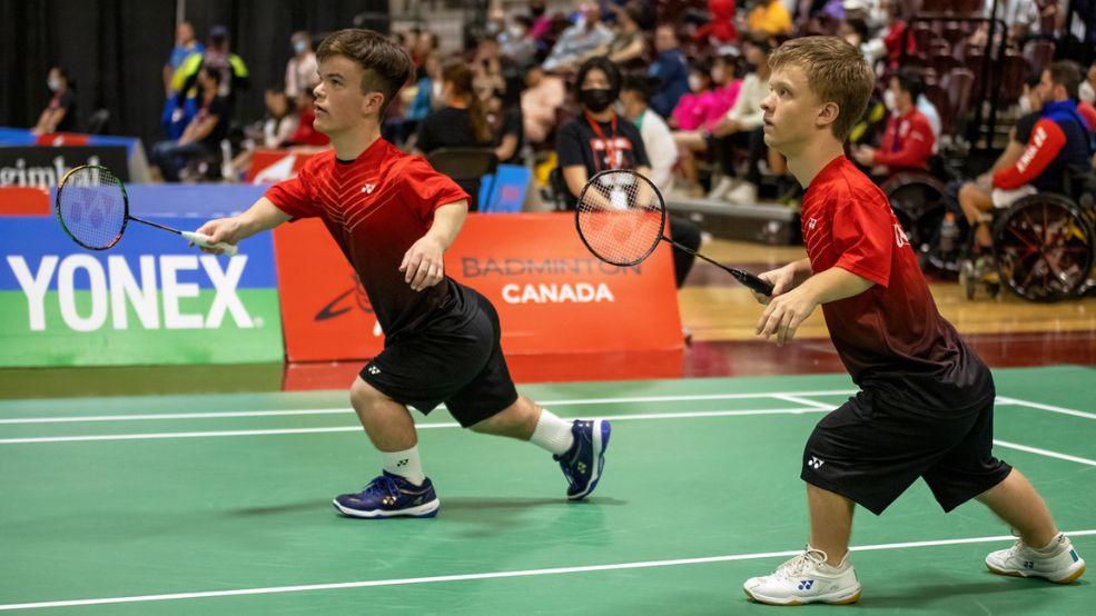 Trombone player plays in crowd of dancing and singing people